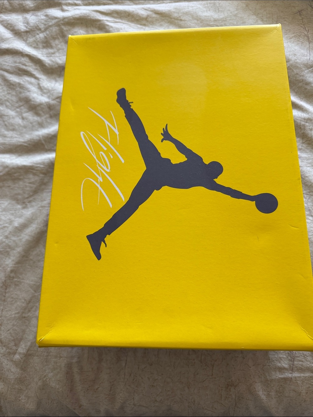 Jordan Yellow and Gray Speckled Air Jordan 4 Box